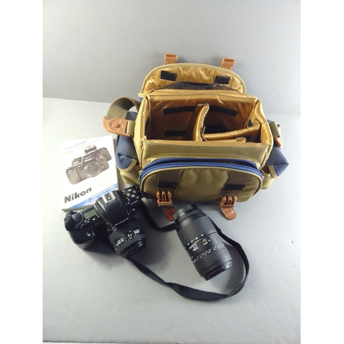 653B - NIKON F-601 camera fitted with Nikon AF Nikkor 35-80mm lens. Also comes with a SIGMA 70-300mm DL Sup... 