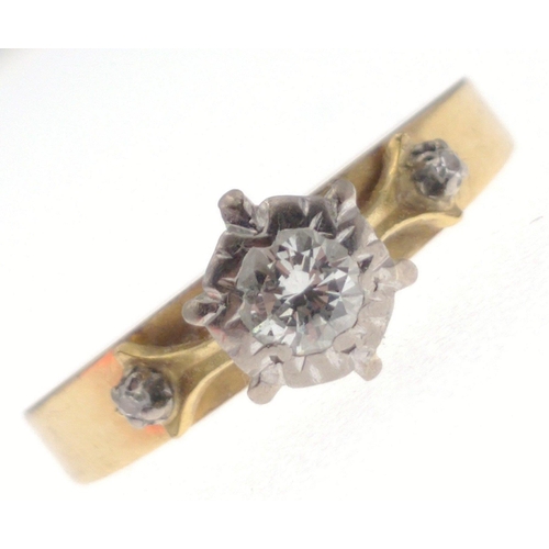 66 - An 18ct indistinctly stamped gold diamond ring with central diamond 4mm approx and 2 smaller stones ... 