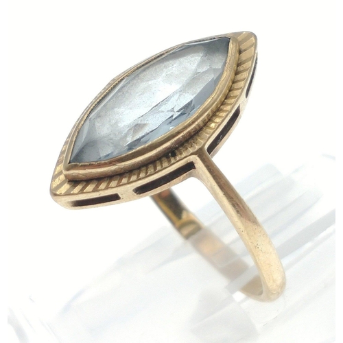 71 - A 9ct gold ring with marquise cut centre stone (14mm) size P, gross weight 3.5g approx#71