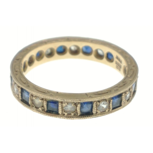 77 - A 375 stamped sapphire and diamond eternity band, size O, gross weight 3.1g approx#77