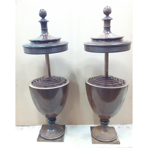 178 - A pair of early 19th century SHERATON style urn-shaped mahogany knife/spoon box, the lid with acorn ... 