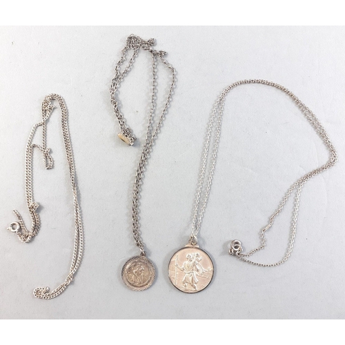 235 - Two silver stamped St Christophers on chains (one 925) and one additional broken silver chain. 15g a... 