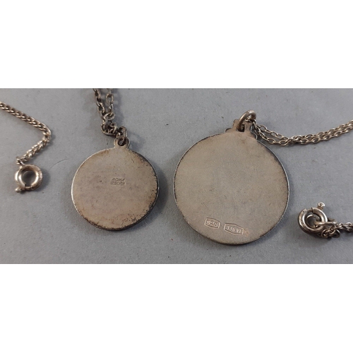 235 - Two silver stamped St Christophers on chains (one 925) and one additional broken silver chain. 15g a... 