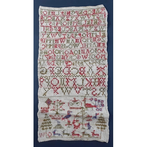 352 - An antique sampler on linen signed by CW measuring 39 x 20cm approx.  In good condition.#50