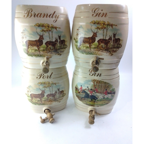 365 - Four large ceramic barrels labelled 2 x gin, brandy, and  port, decorated with countryside scenes of... 