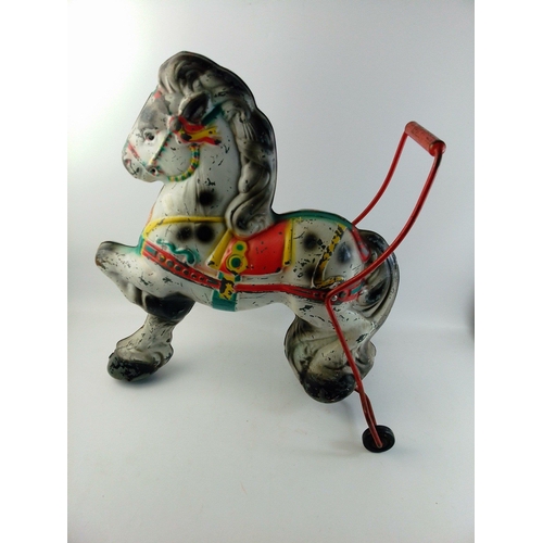 381 - A vintage MOBO PONY tin plate child's push-along carousel horse trike standing 55cm high approx.  So... 