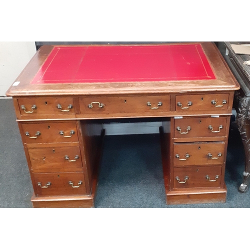 471 - FABULOUS PATINA! An EDWARDIAN nine drawer knee hole desk with red leather writing top - dimensions w... 