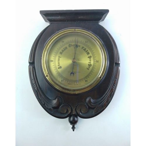 495 - A wall-hanging oak barometer made by KEVIN BOTTOMLEY & BAIRD of Glasgow, stands 30cm approx#121... 