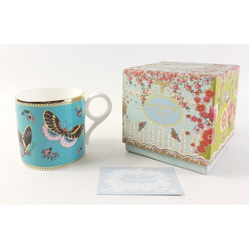 581 - A boxed WEDGWOOD Butterfly Dance mug in presentation box.  A very pretty piece in excellent conditio... 