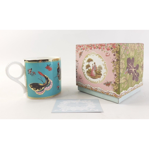 581 - A boxed WEDGWOOD Butterfly Dance mug in presentation box.  A very pretty piece in excellent conditio... 