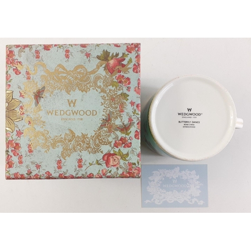 581 - A boxed WEDGWOOD Butterfly Dance mug in presentation box.  A very pretty piece in excellent conditio... 