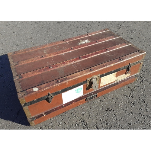 634 - A large well-travelled metal bound trunk W91x 48 x 30cm approx#170