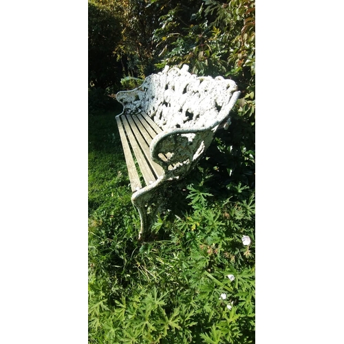 680 - EXQUISITE! A COALBROOKDALE style cast iron fern garden seat, white painted with wooden slat seat, on... 