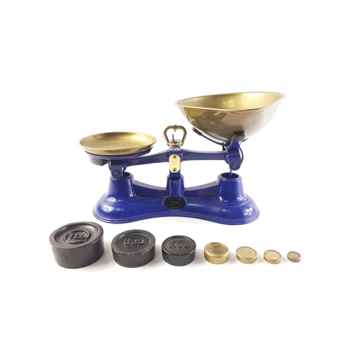 694 - A set of blue SALTER balance scales No 56, weighing up to 2kg.  Comes with weights.   In good condit... 