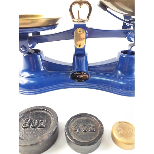 694 - A set of blue SALTER balance scales No 56, weighing up to 2kg.  Comes with weights.   In good condit... 