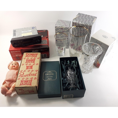 701 - A small collection of boxed crystal vases -4 in total, Rosebud doll, and a Peugeot Blaupunkt Tapedec... 