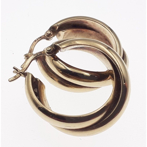 1 - An attractive pair of gold hoop earrings.  Fully stamped 375 - 9ct.  Gross weight 3.4g approx#1