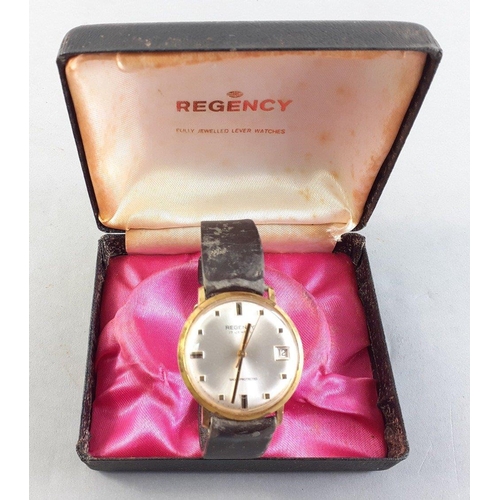 106 - A boxed REGENCY gents watch in original box with a 1971 dated Galashiels dealers warranty.  The watc... 