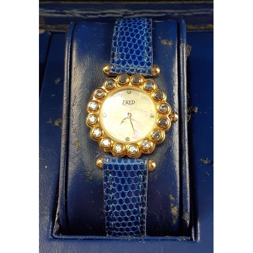 117 - FRED of Paris ladies wrist watch with diamond encrusted bezel and interchangeable straps in original... 