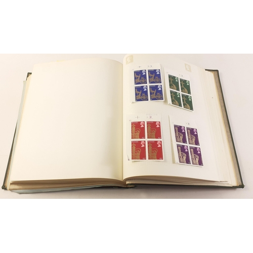 124 - A well collated stamp album comprising UK issues from 1935 - 1970's including some high values and m... 