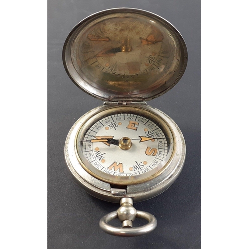 129 - A nice marching compass in a DENNISON OF BIRMINGHAM case dated 1917 with a broad arrow mark#135