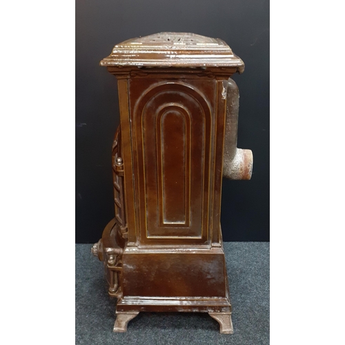 172 - A wonderful antique French GODIN enamelled stove,  75cm tall and with 358 cast number on top.  With ... 