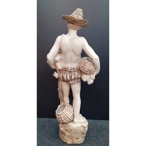 223 - Large BRETBY ivorine colour pottery statuesque figure of Neopolitan fisher boy with baskets.  Bretby... 