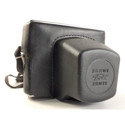 312 - A super Soviet Era ZENIT 11 Camera with HELIOS 2/58 lens in a soft case - appears to be in excellent... 