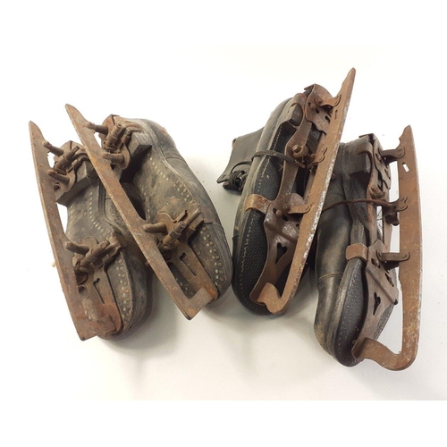 335 - Two pairs of vintage ice skates.#342