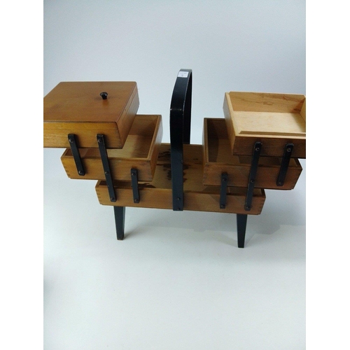 339 - A nice CANTILEVER opening sewing box on 4 legs - dimensions when extended length 90cm x height 45cm ... 