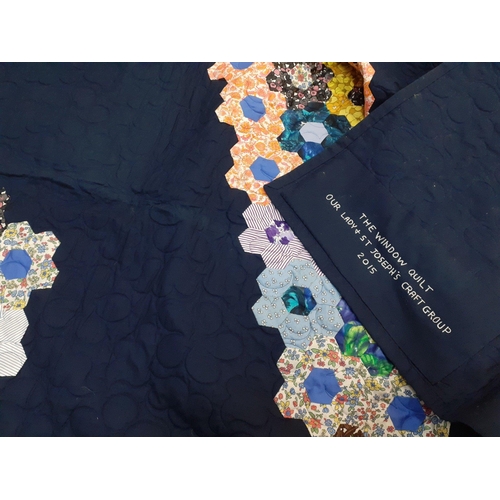 343 - A wonderful hand stitched patchwork large blanket with super floral designs.  Stitched dedication ''... 