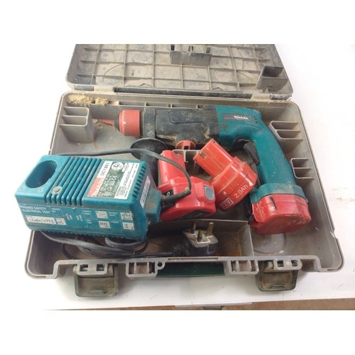 385 - A 12v SDS MAKITA drill in used condition#392