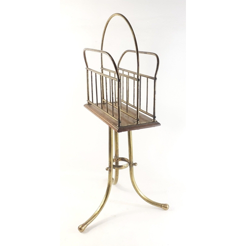 392 - An antique brass and wood magazine stand in nicely patinated condition. 73cm high approx#399