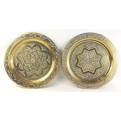 40 - Two attractive brass chargers with Arabic calligraphy on the back. Each 35cm diameter approx#40