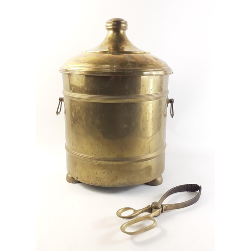 41 - A brass coal pail and tongs, stands 43cm approx#41