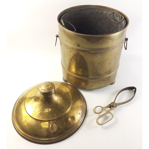 41 - A brass coal pail and tongs, stands 43cm approx#41