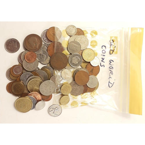 51 - A tub containing a mixture of UK and obsolete world coinage. Also a small number of circulated world... 