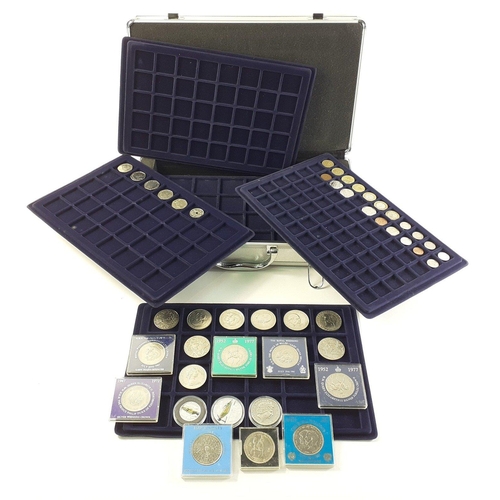 55 - An aluminium coin case with a good selection of crowns, some in holders to include Battle of Britain... 