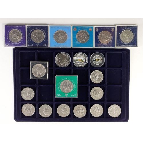 55 - An aluminium coin case with a good selection of crowns, some in holders to include Battle of Britain... 