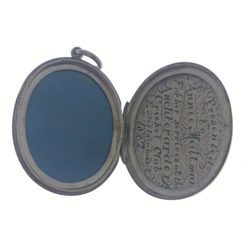 81 - A white metal presentation locket from the Auchtermuchty cricket club dated 1882#82