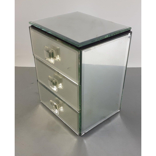 91 - A pretty little two drawer mirrored jewellery box containing a nice selection of some yellow metal e... 