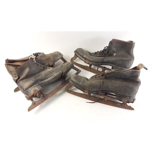 415 - Two pairs of vintage ice skates.#417