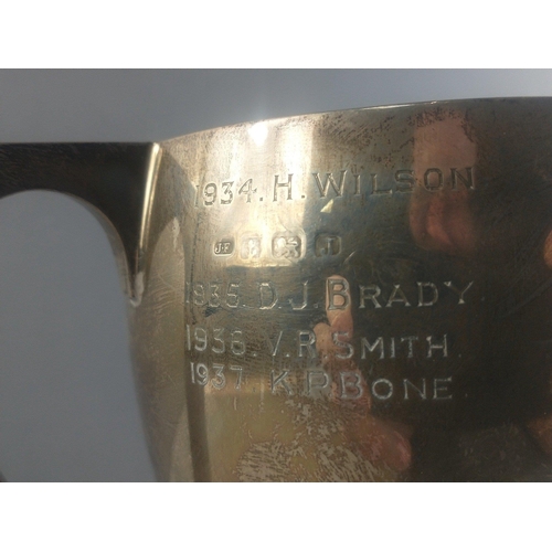 62 - Birmingham hallmarked double handled silver trophy engraved 