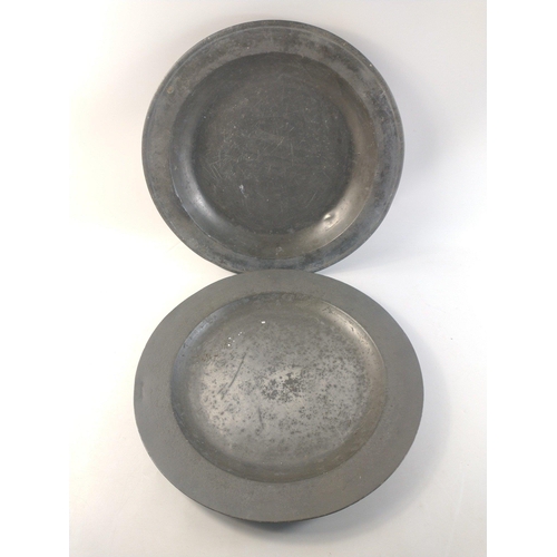 83 - Two large pewter plates each 42cm diameter.#83