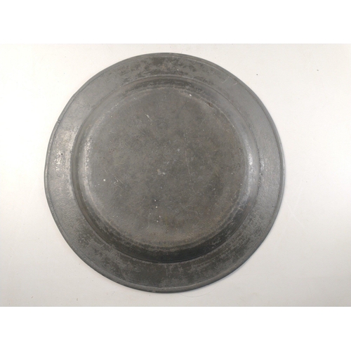 83 - Two large pewter plates each 42cm diameter.#83