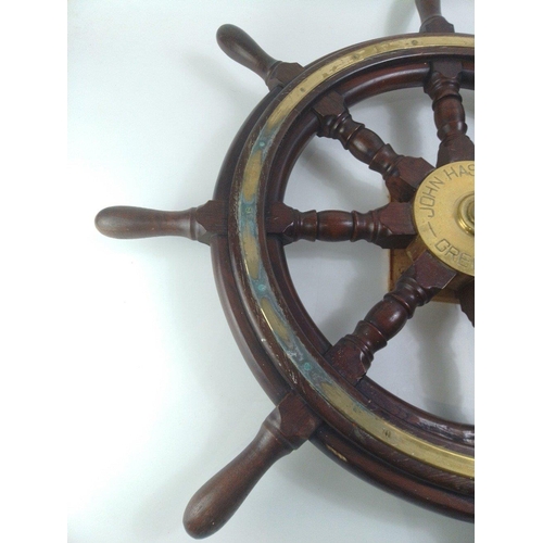 138 - A superb original ship's wheel, 60cm diameter by JOHN HASTIE & CO of GREENOCK.  This wheel was s... 