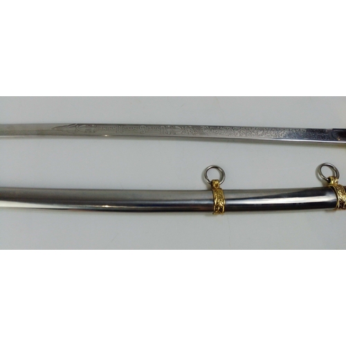 142 - A modern United States Marines dress sword with 76cm blade.#142