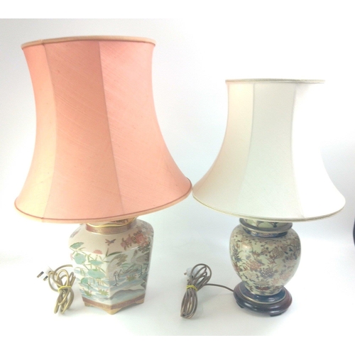 169 - Two Oriental style table lamps both with cream backgrounds and gilt highlights standing approx 33cm ... 