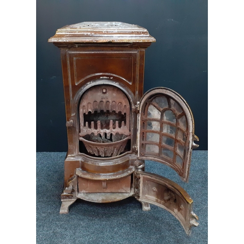 194 - ANTIQUE - A wonderful antique French GODIN enamelled stove,  75cm tall and with 358 cast number on t... 