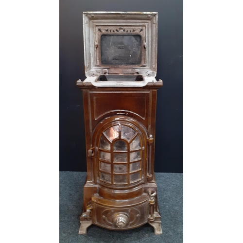 194 - ANTIQUE - A wonderful antique French GODIN enamelled stove,  75cm tall and with 358 cast number on t... 